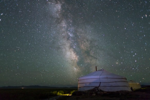 The Milky Way rises over a Mongolian Ger in South Gobi Desert, Mongolia.